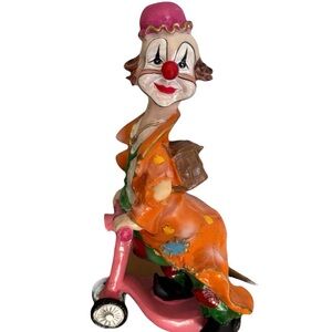 🔴 Colorful Clown Figurine on Scooter